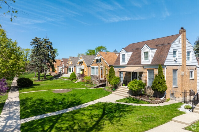 Cape Cod homes sit alongside workers' cottages in Elmwood Park.