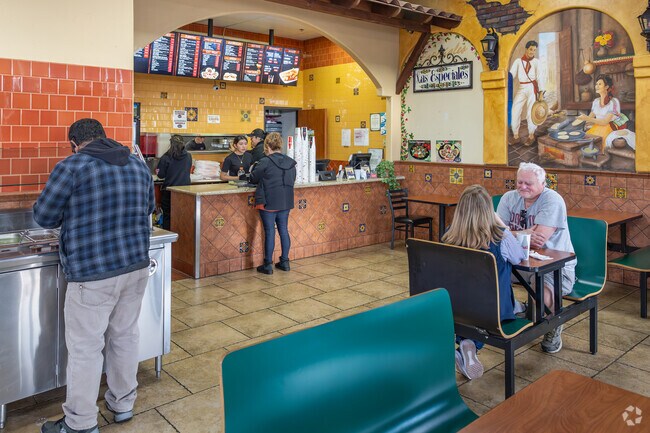 Stop in for some delicious Mexican food at Los Portales Taco Shop in College.