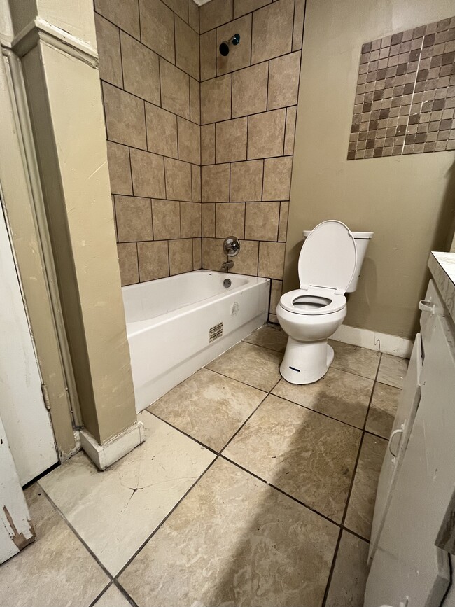 Newly remodeled shower. New toilet