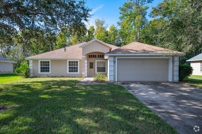 This Lakevue ranch enjoys deep shade from mature trees along quiet residential streets.