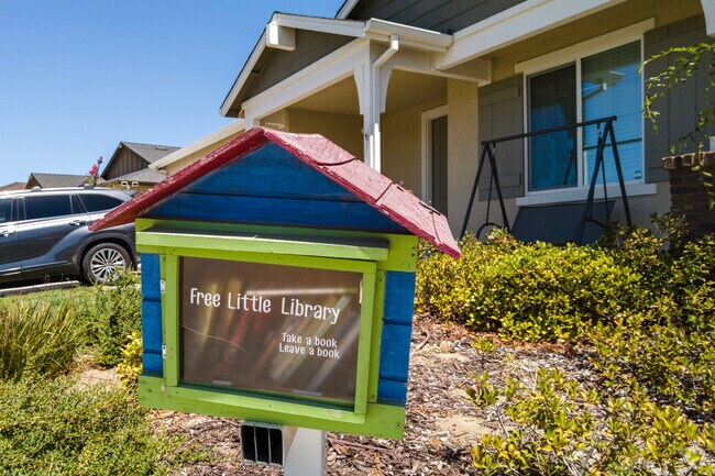 Borrow a book from a neighborhood little library in Keyes.