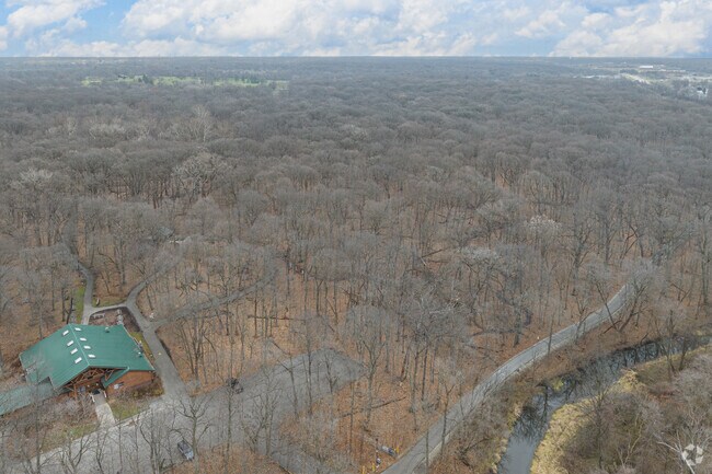 At Pilcher Park Nature Center, locals can travel along the trails by bike or walk.