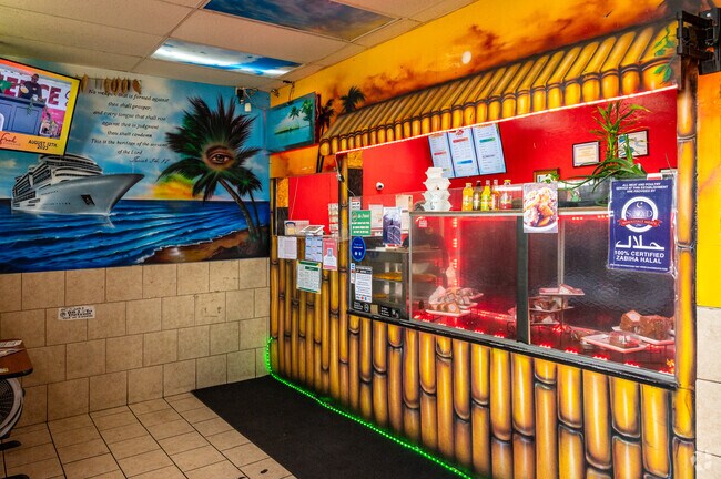 Try Jamaican favorites like jerk chicken & curry goat at The Jamaican Pot.