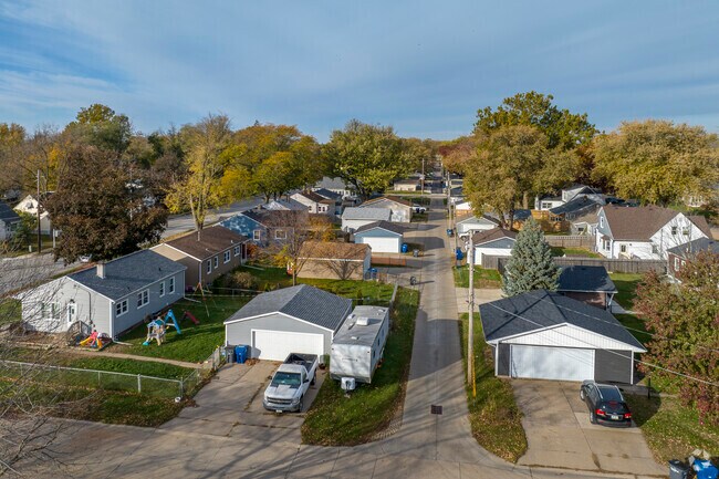 A calm residential street in Edgewood District.