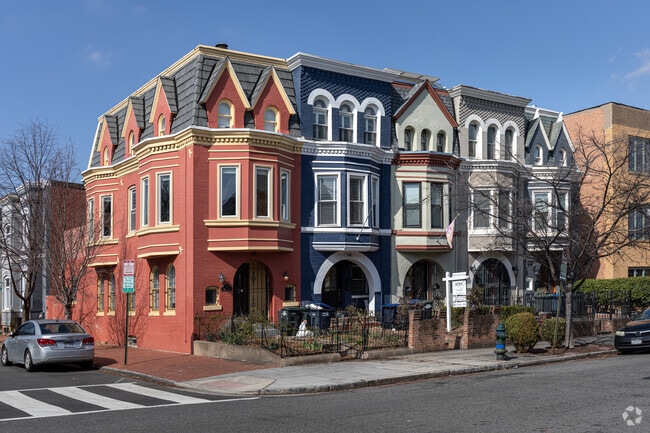 Multicolored Victorian town homes on 5th St NE in Atlas District.