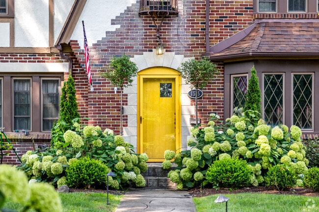 Streets in Wallhaven are lined with brightly colored doors and ornate architectural details.