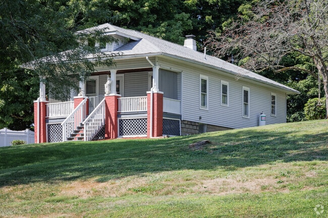 A beautiful bungalow sits up on a hill in Milton.