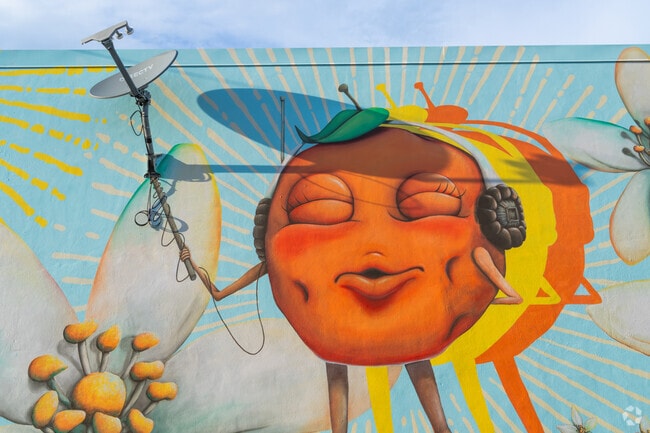 Admire the famous orange mural in Vero Beach that brightens the neighborhood's artistic vibe.