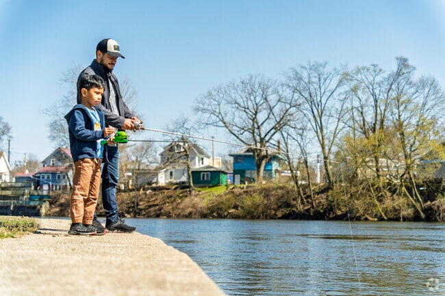 A father and son from South Shore-Bridge Street fish the St Joseph River.