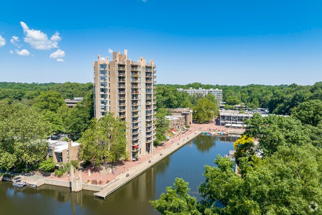Condos by the water with shops below make for a pampered lifestyle in Lake Anne.
