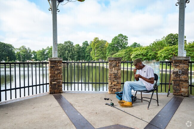 The stocked lake at Bob Noble Park brings out residents of Carson Park to fish.