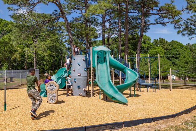 Families create lasting memories at Luan Park near Rolling Acres neighborhood.