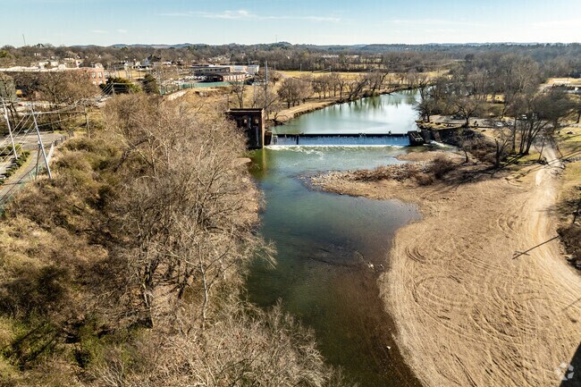 An old hydroelectric plant and the dam are the main features of Fisherman's Park.