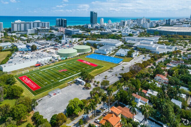 Aerial view of Miami Beach Senior High School and Miami Beach.