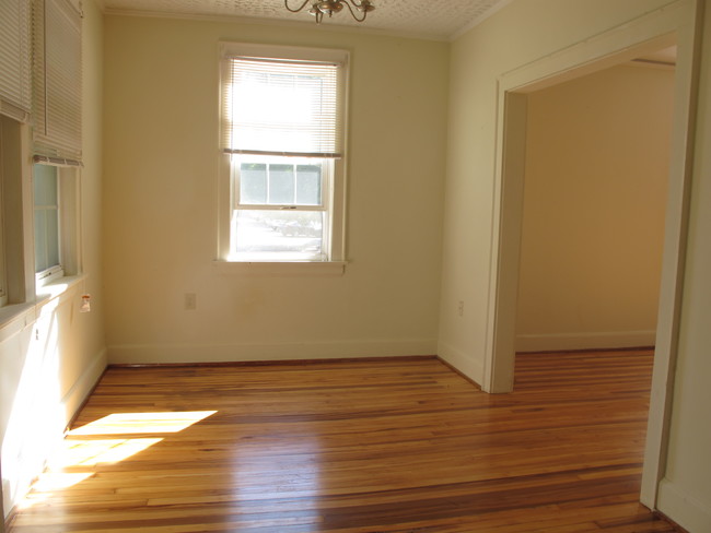 Dining room with maple floors