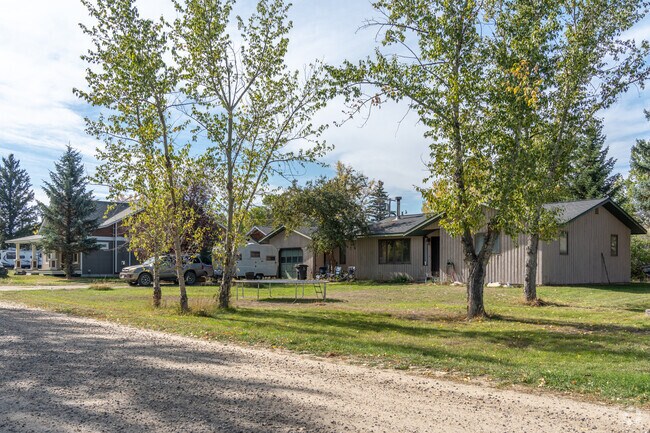 Explore a row of twin homes in Willow Creek, offering stylish living and a sense of community.