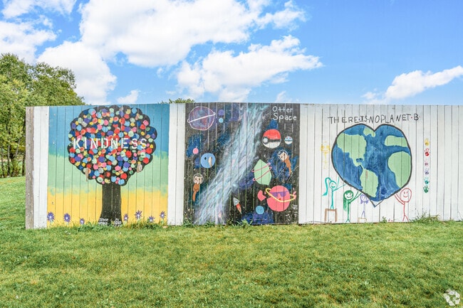 Murals brighten the nearby streets surrounding Remington Trails and Round Lake.