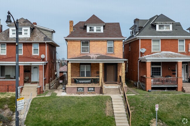 American foursquare homes are scattered throughout Brooklines neighborhood.
