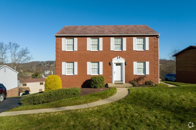 A Colonial home with a view of the Outlying North Franklin Township neighborhood.