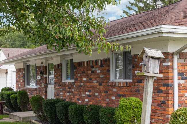 Little touches of exterior décor brighten up the fronts of homes throughout Point Place.