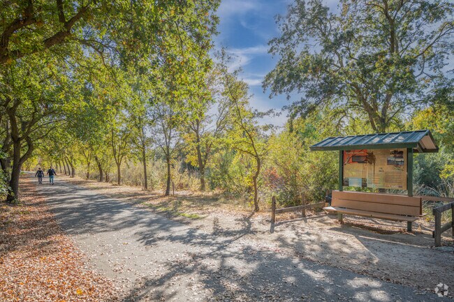 A couple ladies enjoy a walk along the Laguna Creek Trail.