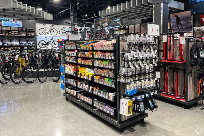 Find a variety of outdoor sporting goods at Scheels, just a short drive from Village.