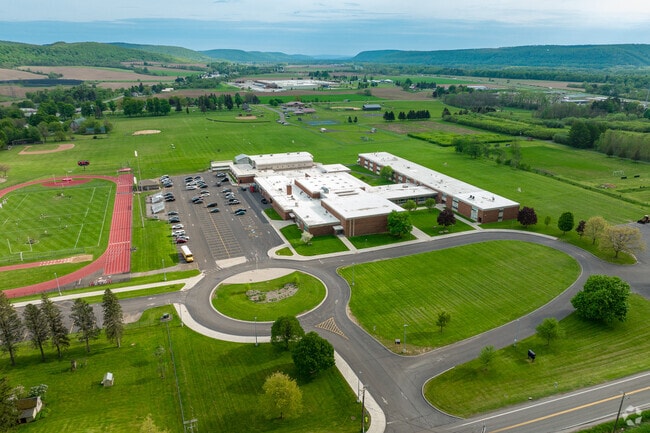 Tully Junior-Senior High offers a strong curriculum featuring Advanced Placement courses in subjects like Biology, Calculus, Chemistry, and U.S. History.