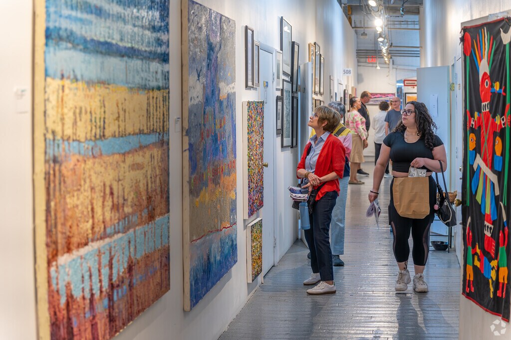 Visitors explore art galleries at the YOHO Artists Open Studio during Yonkers Arts Weekend.