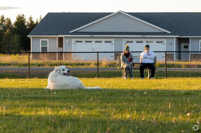 Friendship Park offers a fenced dog park.