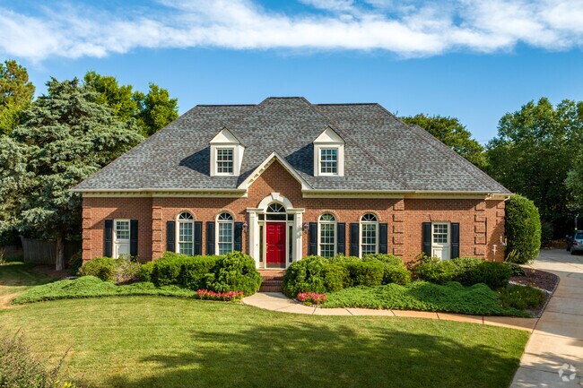 A brick colonial style home in the Whiteoak neighborhood of Charlotte.