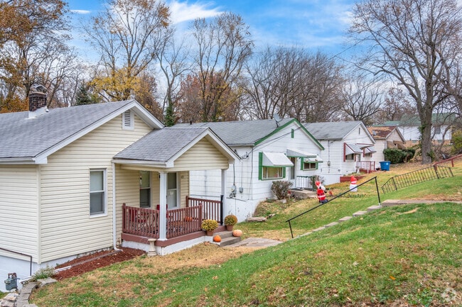Some homes in the Riverview neighborhood are built on a hill with steps down to their entry.