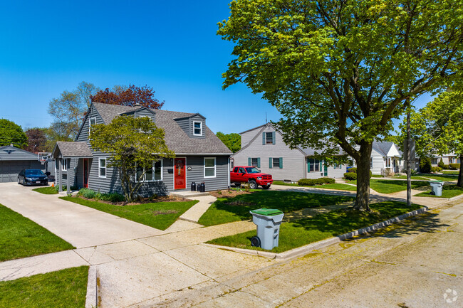 A lovely row of Cape Cod style homes in the Rolling Green neighborhood.
