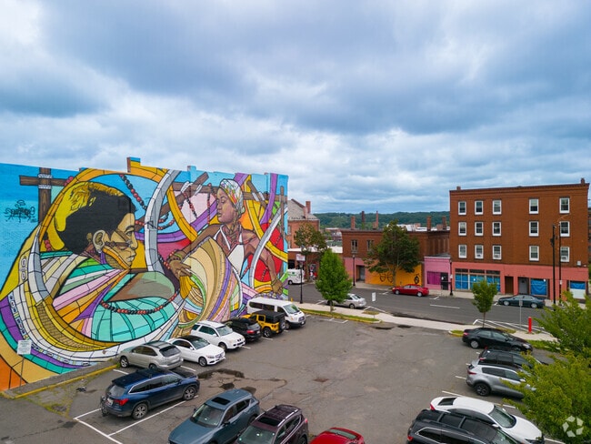 Thought-provoking murals line the sides of some buildings in Holyoke.