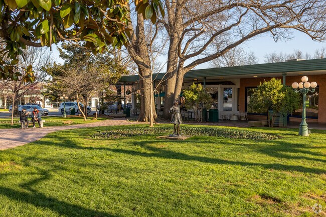 Residents can be seen relaxing in the sun of Sunrise Terrace located in Tulsa, OK.