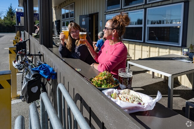 Greenview-Windsong neighbors cheer to great day at Red Curtain Brewery.