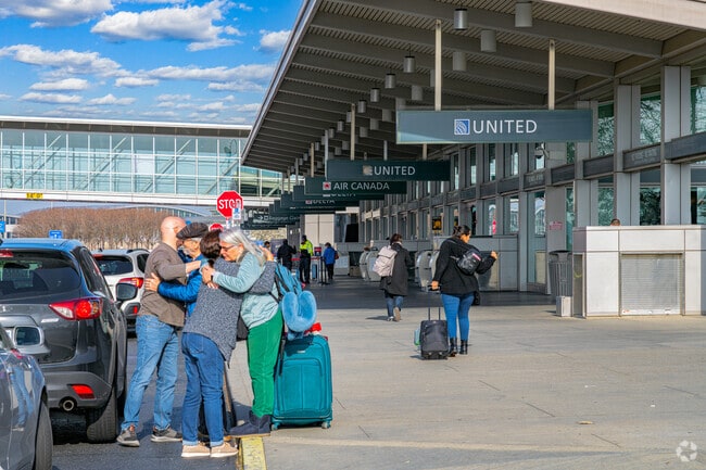 Friends say goodbye at the Sacramento International Airport near Northlake.