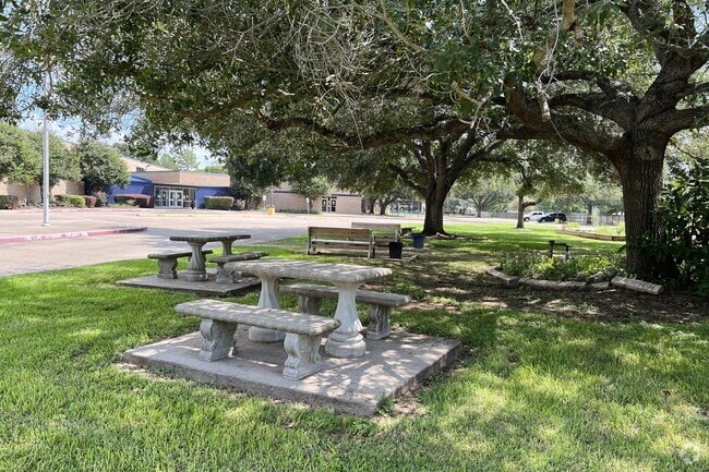 Seating in the shaded area at Pecan Grove Elementary School.