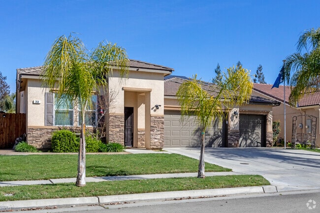 New homes with Mediterranean accents are being built on the edges of Sanger.