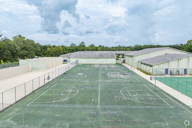 Students enjoy outdoor play on the sports courts at D. S. Parrott Middle School.