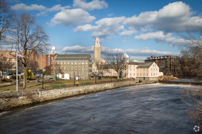 The scenic water views at Old Slater Mill Park in Pawtucket offer a peaceful retreat.
