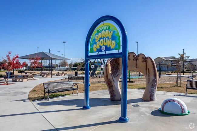 Residents of Kerman can find relief on hot summer days at local splash pads like the one at Trini's Park.
