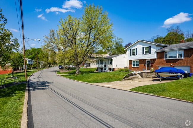 Homes sits along quiet, winding roads in Green Tree.