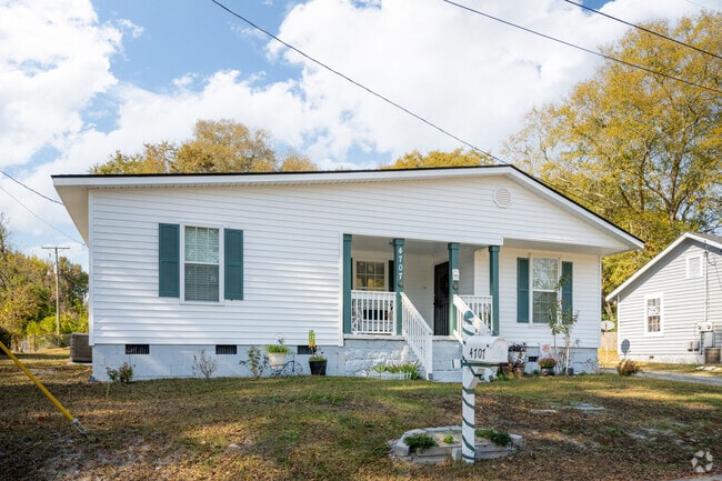 This modest property in Burton Heights features green accents.