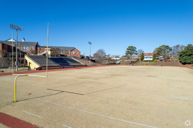 Landmark Christian School features a football field with stadium bleachers.