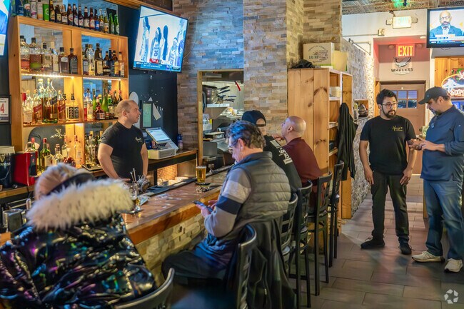 Lawrence Park locals love to hang out at Henry's for great food and drinks.