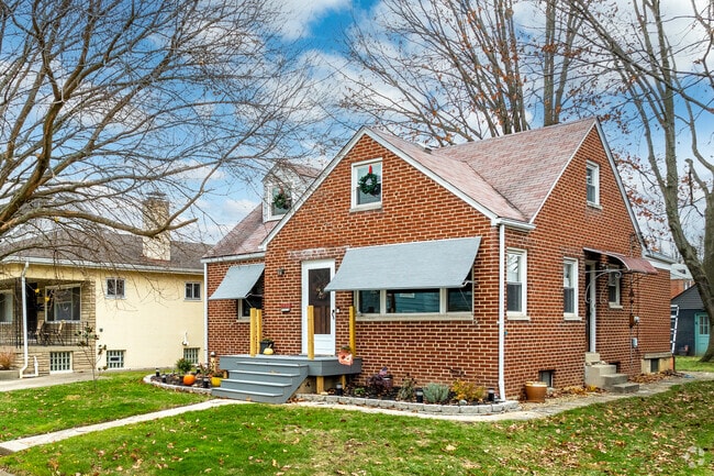 Cape Cod-style homes are common across residential blocks.