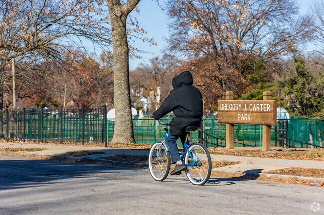 Resident goes for a bike ride near Gregory J. Carter Park.