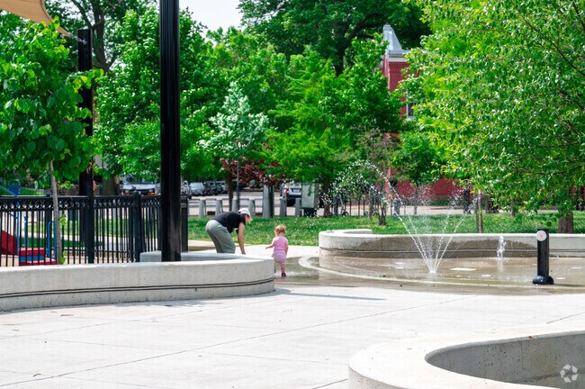 A couple fountains form a small splash park at The Park at LeDroit, perfect for a hot day.