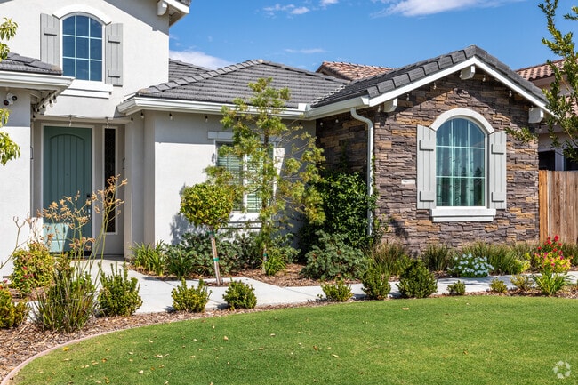 Admire the picturesque landscaping of a single-family home in the 42nd Street.
