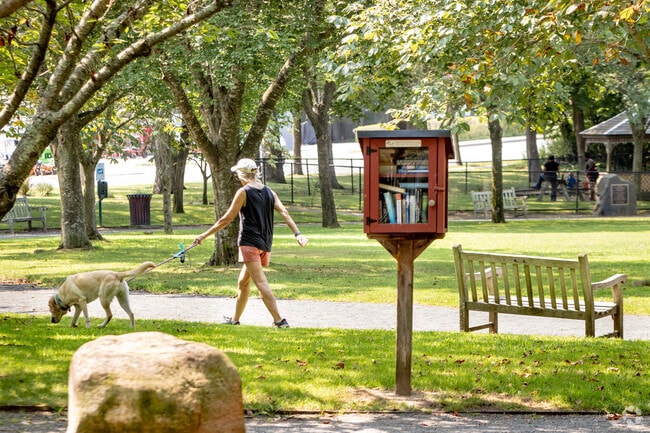 Take your dog for a walk at East Quogue Village Green, a local community park.